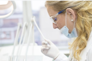 dentist in her clinic 